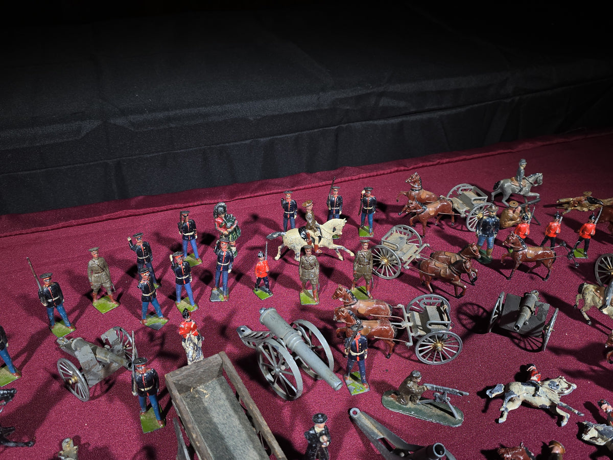 Large Grouping of Antique and Vintage Lead Toy Soldiers, Horses, Cannons, and Artillery including British and French Military Figures