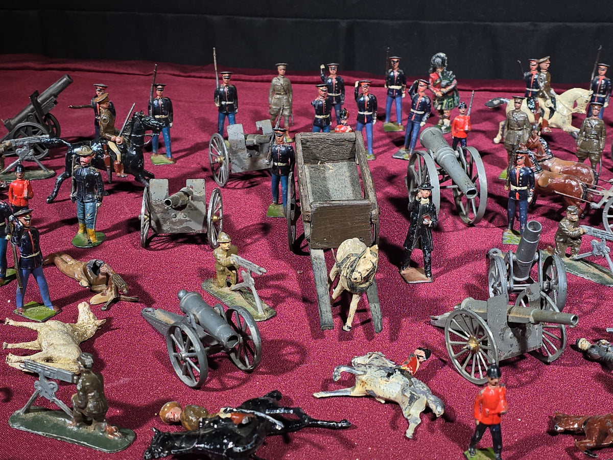 Large Grouping of Antique and Vintage Lead Toy Soldiers, Horses, Cannons, and Artillery including British and French Military Figures