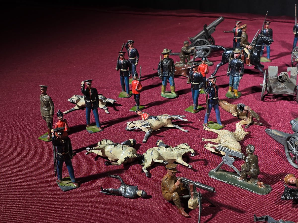 Large Grouping of Antique and Vintage Lead Toy Soldiers, Horses, Cannons, and Artillery including British and French Military Figures