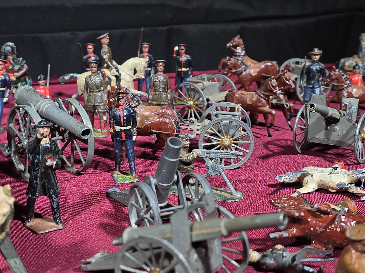 Large Grouping of Antique and Vintage Lead Toy Soldiers, Horses, Cannons, and Artillery including British and French Military Figures