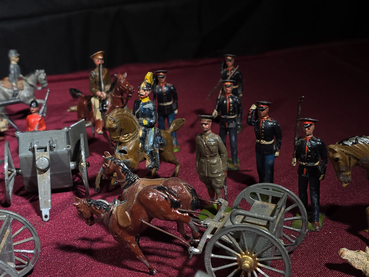 Large Grouping of Antique and Vintage Lead Toy Soldiers, Horses, Cannons, and Artillery including British and French Military Figures