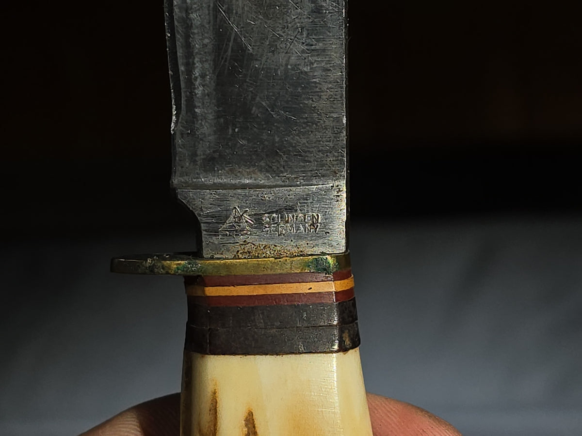 Grouping of Antique and Vintage Tools and Hardware including Apple Peeler, Hand Drill, Halberd-Style Spear Heads, and Solingen Germany Hunting Knife