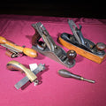 Lot 060 - Grouping of Five Antique and Vintage Woodworking Tools Including Stanley Bailey No. 3 Bench Plane, Stanley Router Plane, and R. Sauerbier Newark, New Jersey Marking Gauge