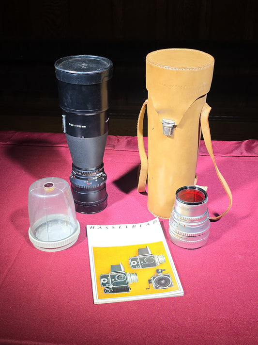 Pair of Vintage Hasselblad Carl Zeiss Lenses including Sonnar 150mm f/4 and Tele-Tessar 350mm f/5.6 with Leather Case, Filter, and Hasselblad Catalog