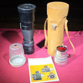 Lot 028 - Pair of Vintage Hasselblad Carl Zeiss Lenses Including Sonnar 150mm F/4 and Tele-Tessar 350mm F/5.6 with Leather Case, Filter, and Hasselblad Catalog