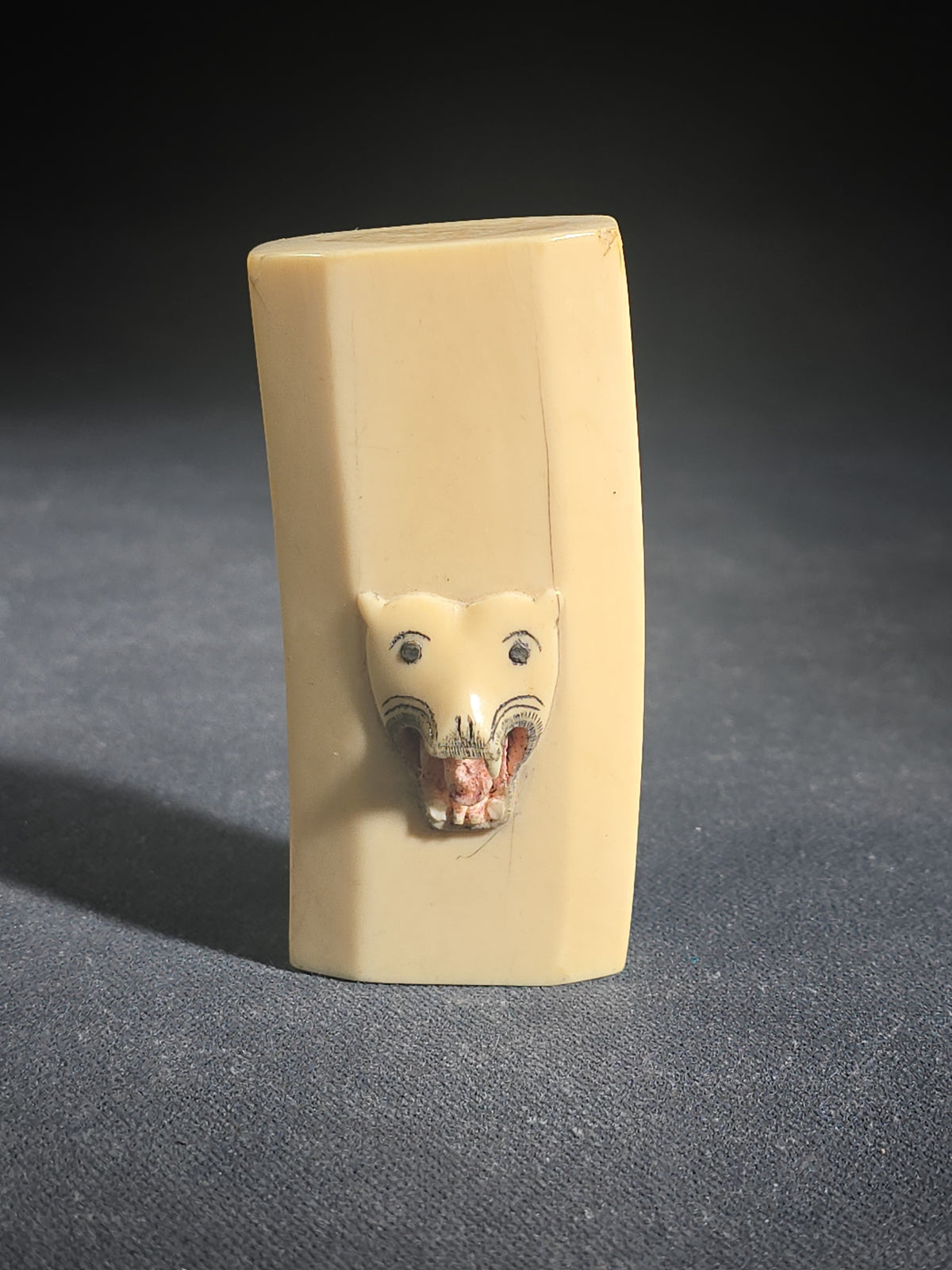 Antique Carved Ivory Piece with Panther Head in Relief, Drilled Side Hole
