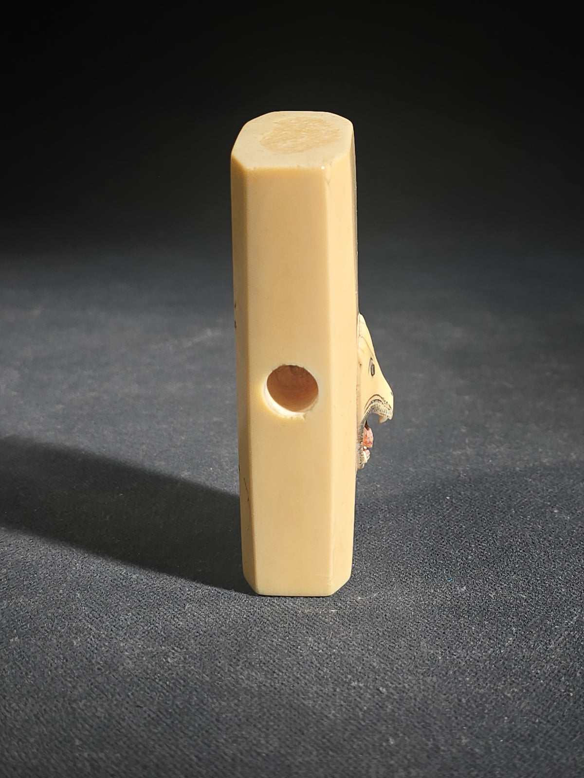 Antique Carved Ivory Piece with Panther Head in Relief, Drilled Side Hole