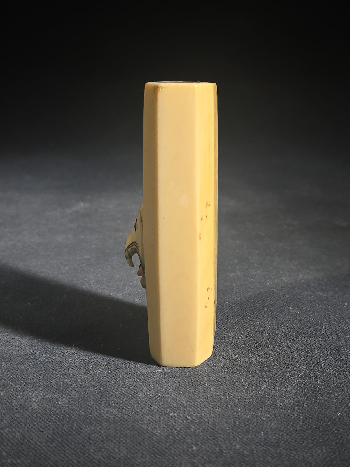 Antique Carved Ivory Piece with Panther Head in Relief, Drilled Side Hole