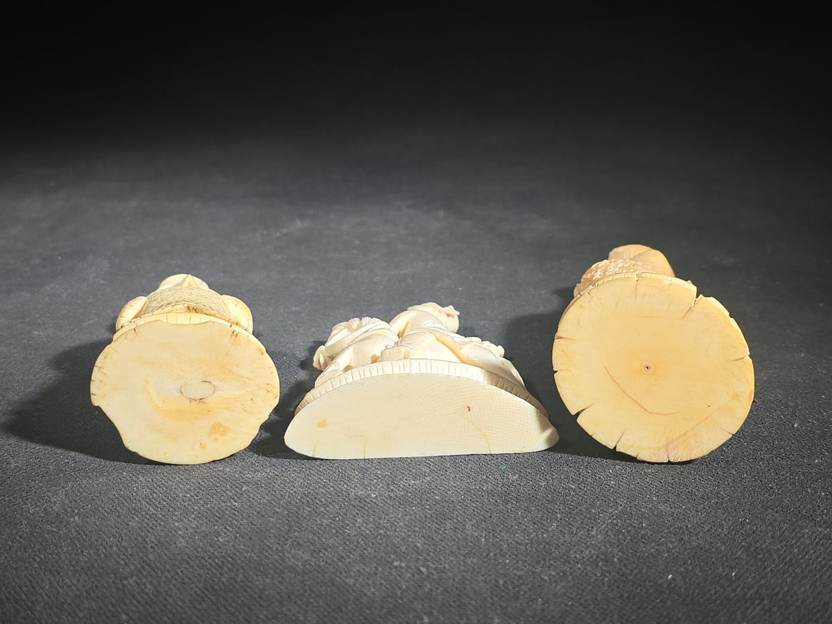 Trio of Antique Carved Ivory Chess Pieces including King, Queen, and Knight