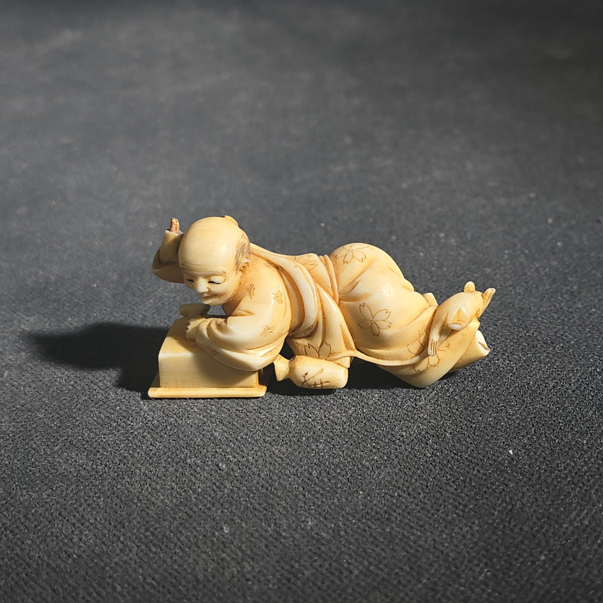 Trio of Antique Japanese Carved and Polychrome-Tinted Ivory Netsuke Figures