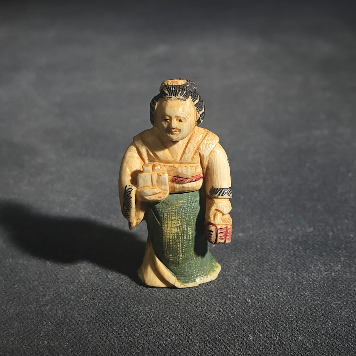 Trio of Antique Japanese Carved and Polychrome-Tinted Ivory Netsuke Figures