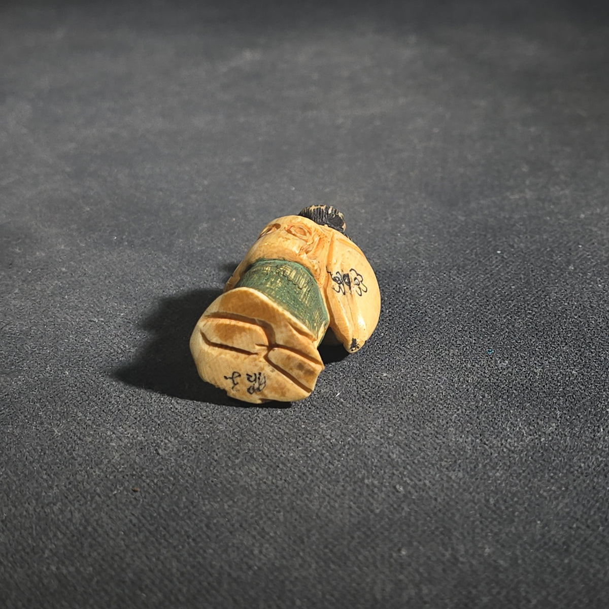 Trio of Antique Japanese Carved and Polychrome-Tinted Ivory Netsuke Figures