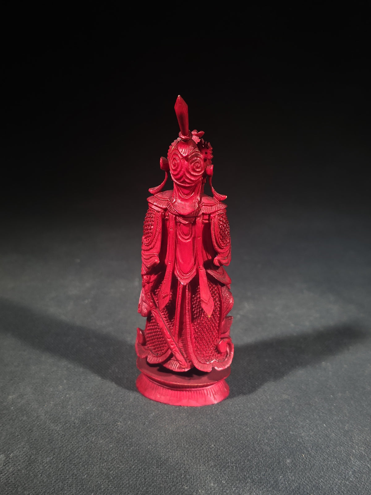 Antique Red-Dyed Carved Ivory Chinese Figural Chess Piece, Bearded Warrior King with Elaborate Headdress and Armor