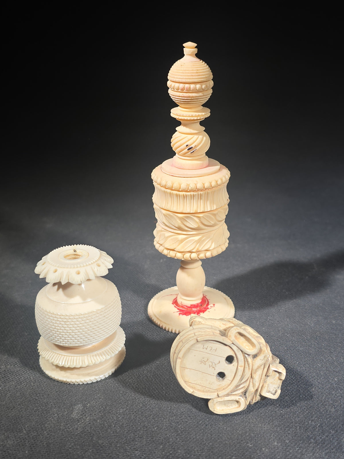 Trio of Vintage Carved Faux Ivory Pieces including Turned Finial, Lidded Vessel, and Figural Netsuke-Style Carving