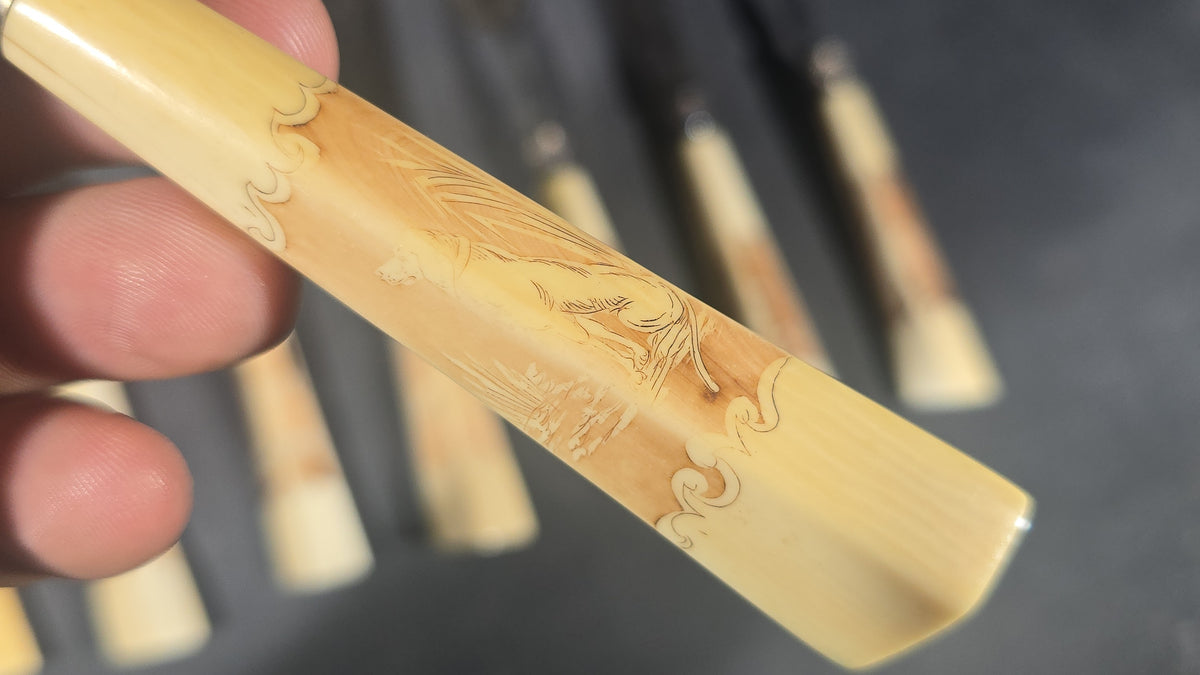 Grouping of Nine Antique Engraved Fish Knives and Forks with Carved Bone Handles Depicting Animals and Landscape Scenes, Marked J.H. Potter, Sheffield