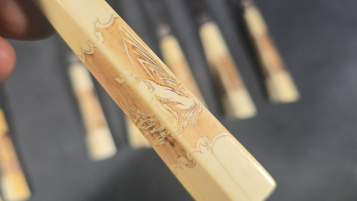 Grouping of Nine Antique Engraved Fish Knives and Forks with Carved Bone Handles Depicting Animals and Landscape Scenes, Marked J.H. Potter, Sheffield