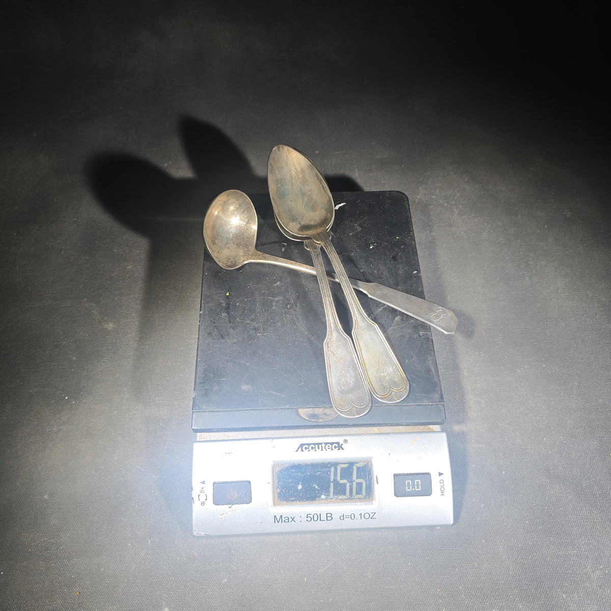 Trio of Antique Sterling Silver Flatware Pieces including Two Fiddle-Thread Tablespoons Monogrammed "P" and a Coffin-End Sauce Ladle Monogrammed "C.A.F."
