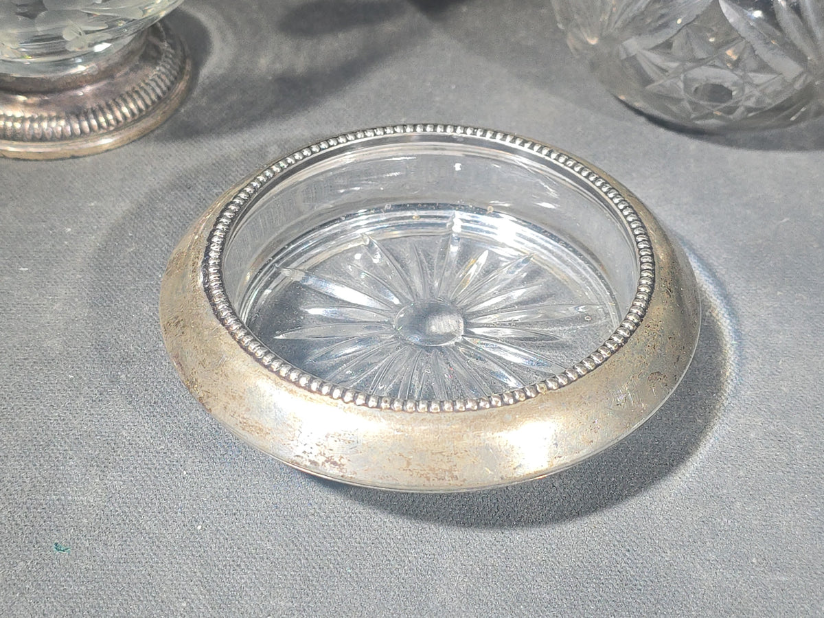 Grouping of Three Vintage Sterling Silver and Glass Tableware Pieces including Etched Two-Handled Sugar Bowl, Cut Glass Vanity Jar, and Glass Coaster