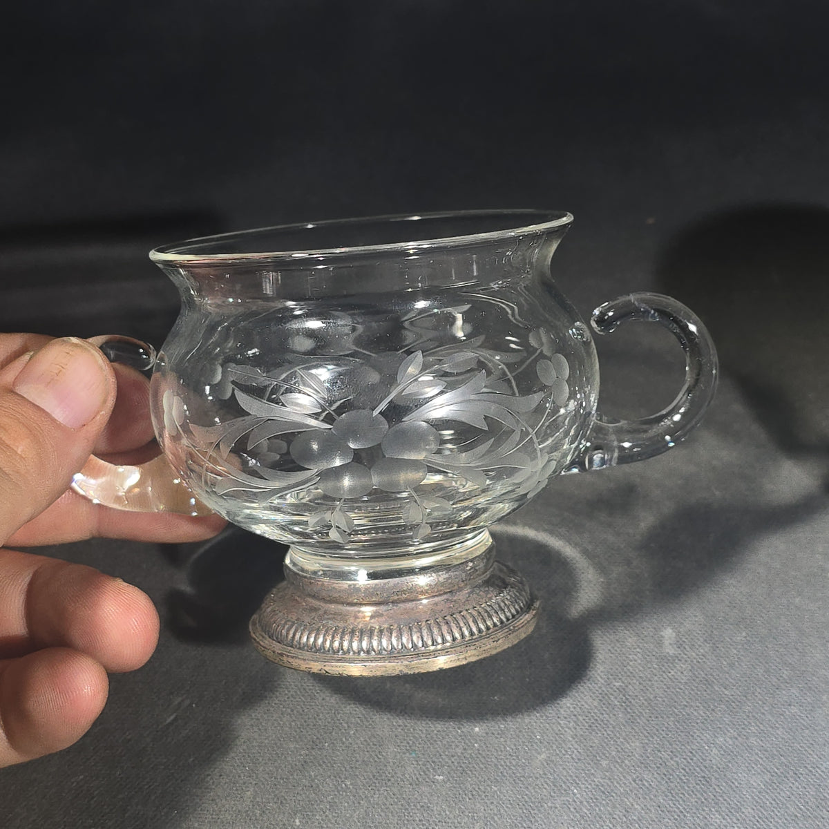 Grouping of Three Vintage Sterling Silver and Glass Tableware Pieces including Etched Two-Handled Sugar Bowl, Cut Glass Vanity Jar, and Glass Coaster
