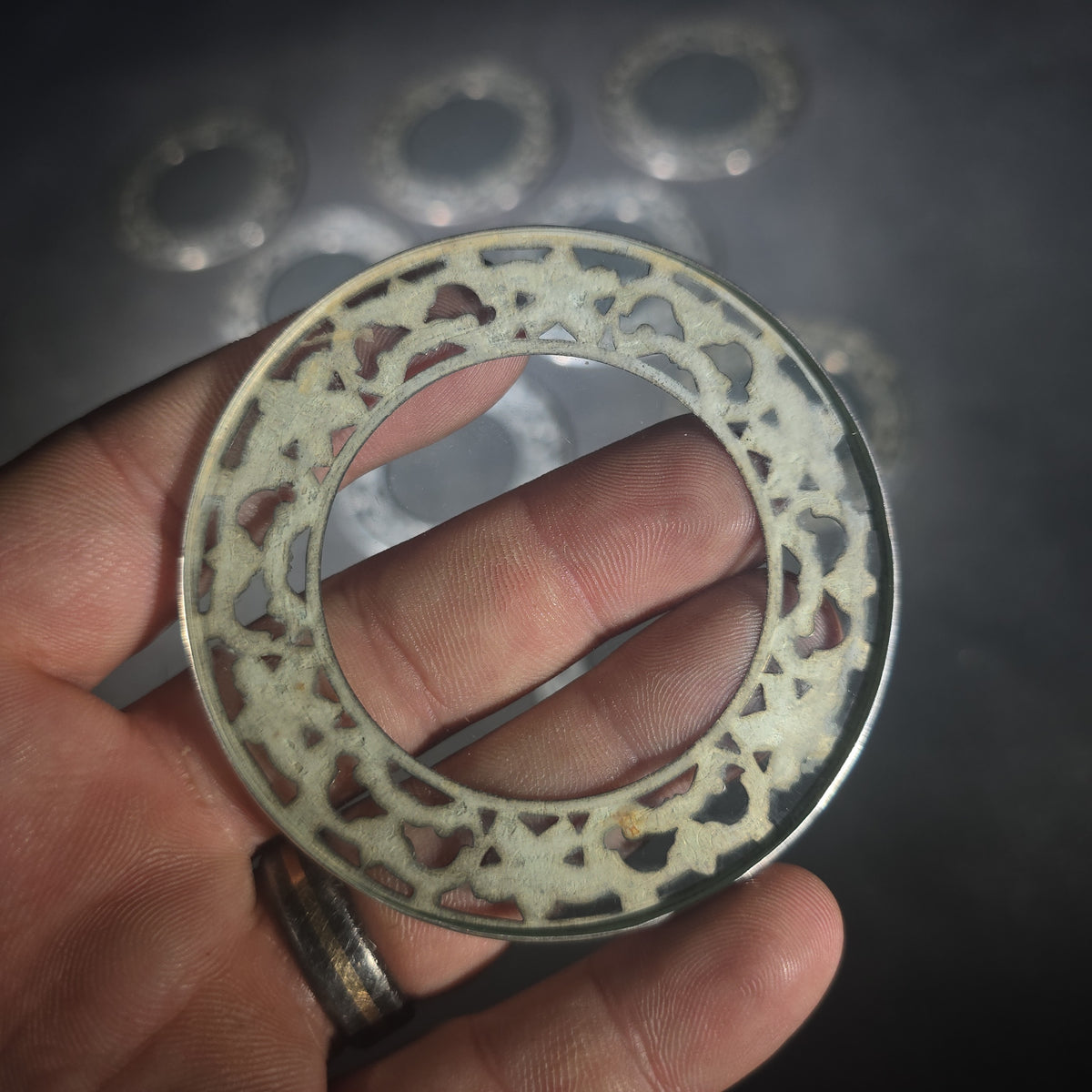Grouping of 10 Sterling Silver and Glass Coasters with Pierced Floral Overlay