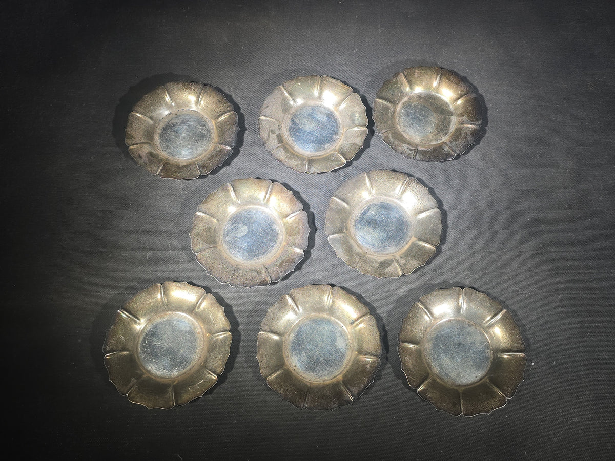Grouping of Eight Sterling Silver Petal-Form Nut Dishes