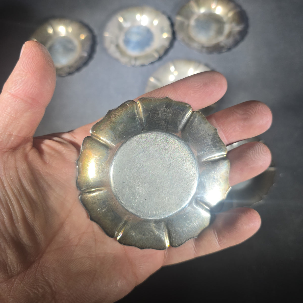 Grouping of Eight Sterling Silver Petal-Form Nut Dishes