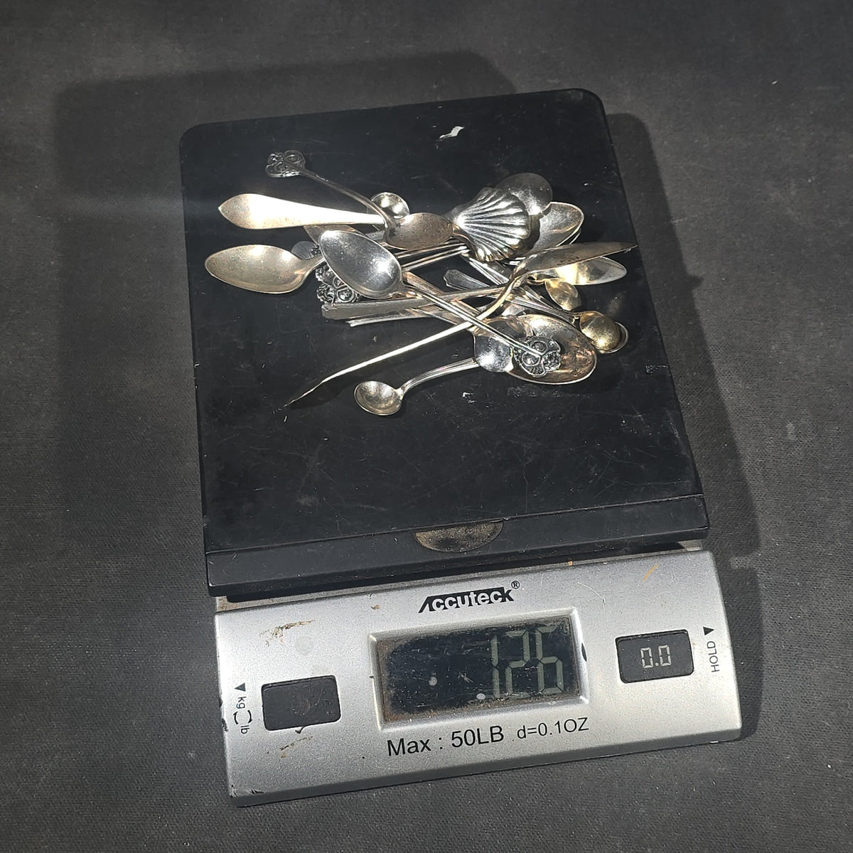 Grouping of 18 Sterling Silver Demitasse Spoons in Assorted Patterns