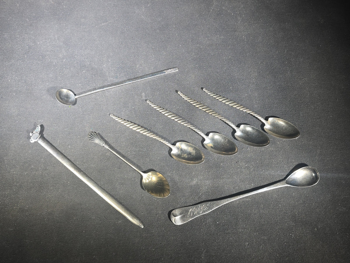 Grouping of Eight Antique and Vintage Sterling Silver Pieces including Seven Demitasse Spoons and One Letter Opener