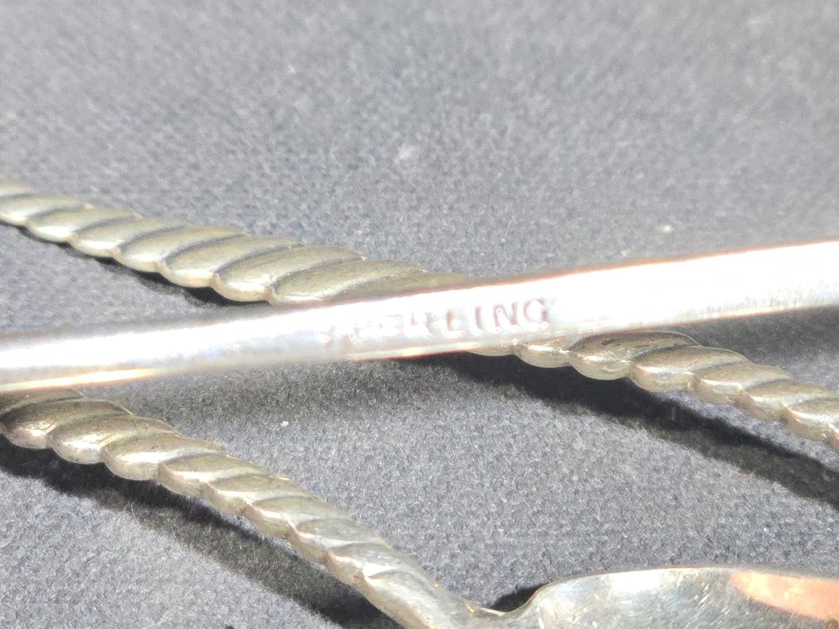 Grouping of Eight Antique and Vintage Sterling Silver Pieces including Seven Demitasse Spoons and One Letter Opener