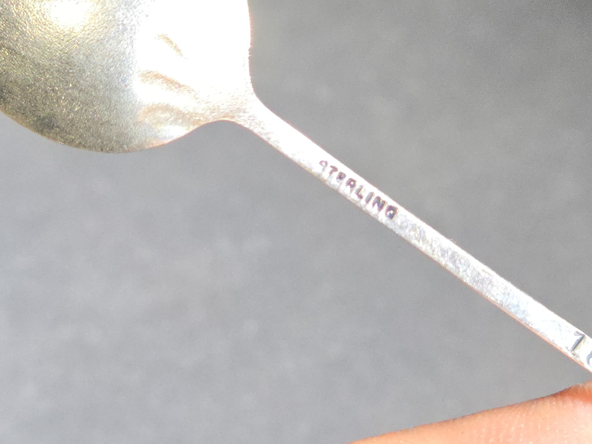 Grouping of Eight Antique and Vintage Sterling Silver Pieces including Seven Demitasse Spoons and One Letter Opener