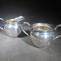 Lot 056 - Sterling Silver Monogrammed Creamer and Open Sugar Bowl with Gold Wash Interior, Manufactured by P.S. Co., Pattern 702, Weight 200 g