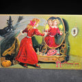 Lot 015 - Antique Embossed Halloween Postcard with Mirror Divination Scene, Black Cat, and Pumpkin, Published by Raphael Tuck & Sons, Series No. 150, Postmarked 1909