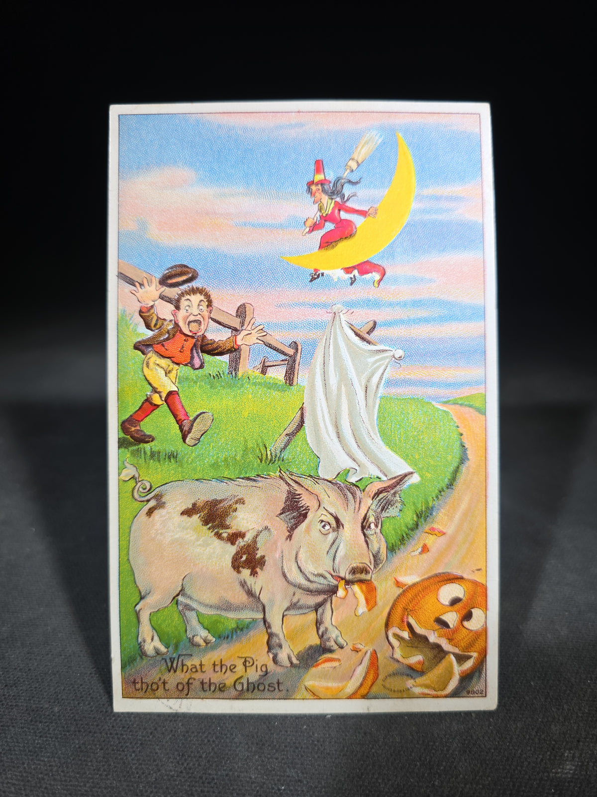 Antique Embossed Halloween Postcard "What the Pig Tho't of the Ghost" with Witch on Crescent Moon and Jack-O-Lantern, Halloween Series Number 980, Postmarked 1910