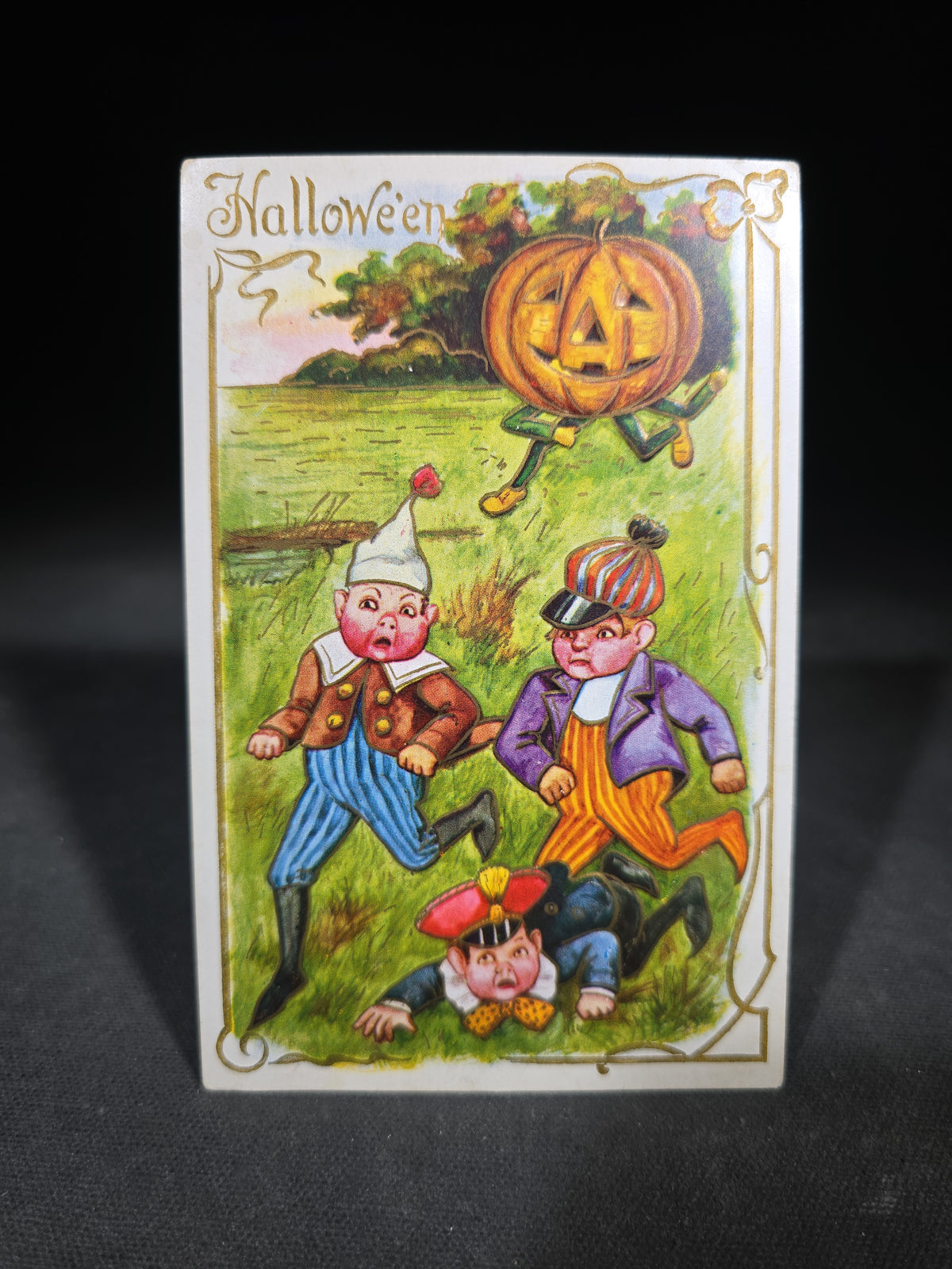 Antique Embossed Halloween Postcard with Jack-O-Lantern Figure Chasing Three Boys, Postmarked Nashua, New Hampshire, 1909