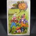 Lot 069 - Antique Embossed Halloween Postcard with Jack-O-Lantern Figure Chasing Three Boys, Postmarked Nashua, New Hampshire, 1909