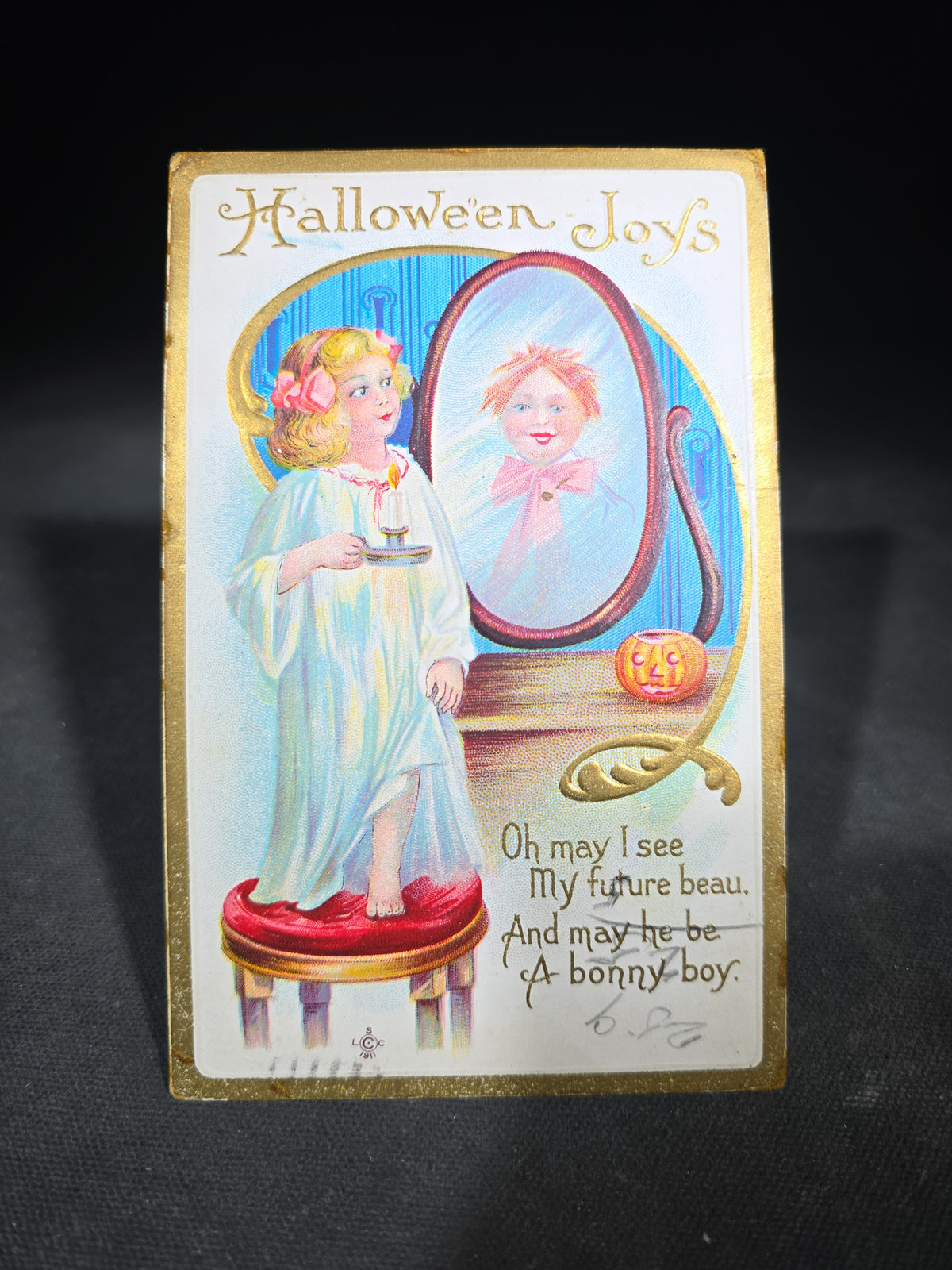 Antique Embossed "Hallowe'en Joys" Postcard with Girl Holding Candle Before Mirror and Jack-O-Lantern, Series 226 A