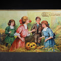 Lot 070 - Antique Embossed "Hallowe'en" Postcard with Children Bobbing for Apples and Jack-O-Lantern, Published by Raphael Tuck & Sons, Series No. 183, Printed in Saxony