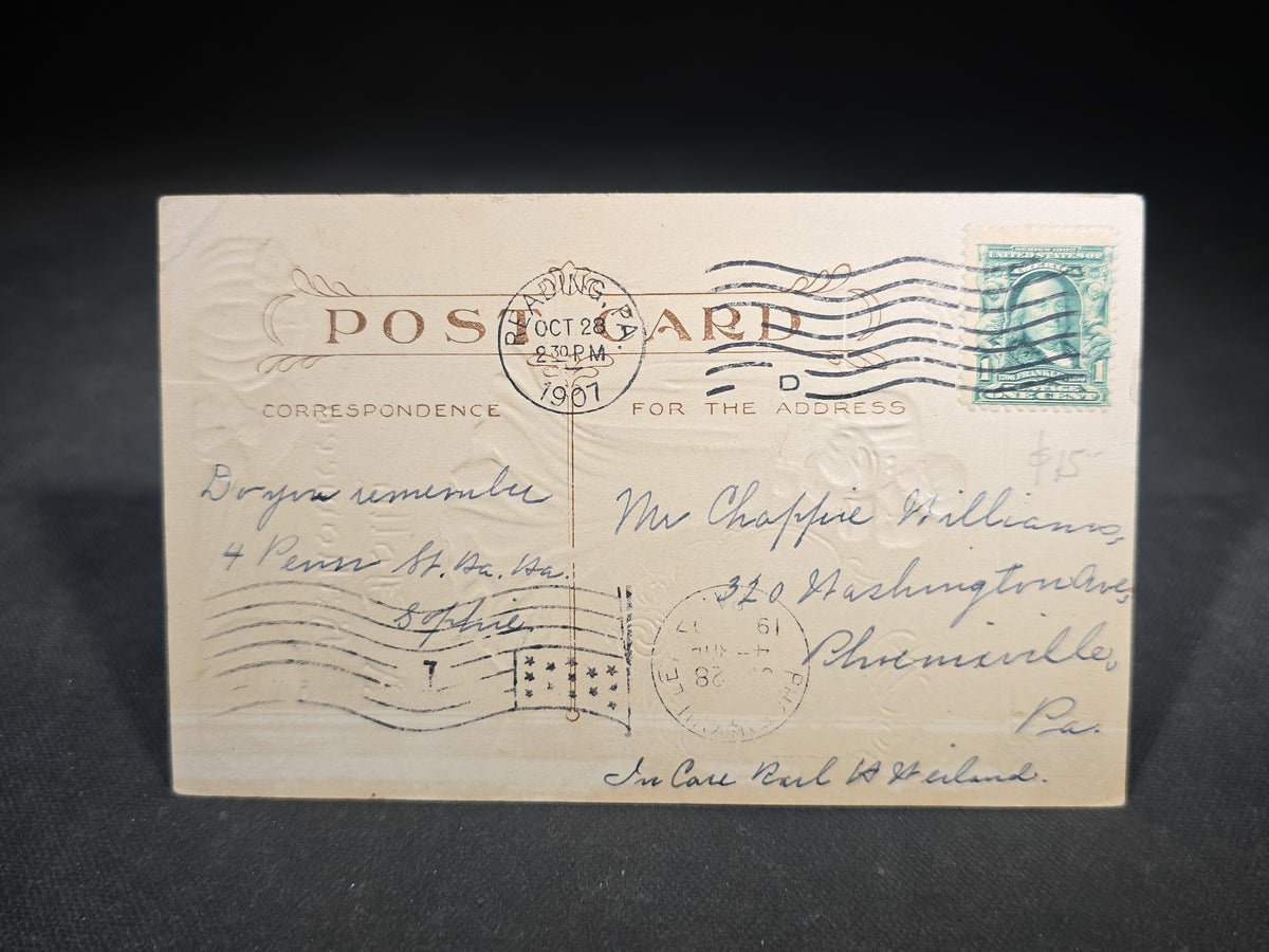 Antique Embossed "A Jolly Halloween" Postcard with Couple Embracing by Grandfather Clock, Black Cat, Bat, Owl, and Jack-O-Lantern, Postmarked Reading, Pennsylvania, 1907