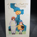 Lot 100 - Antique Embossed "A Hallowe'en Greeting" Postcard with Two Children, Jack-O-Lantern, and Black Cats, Published by Whitney, Worcester, Massachusetts, Postmarked Plano, Illinois