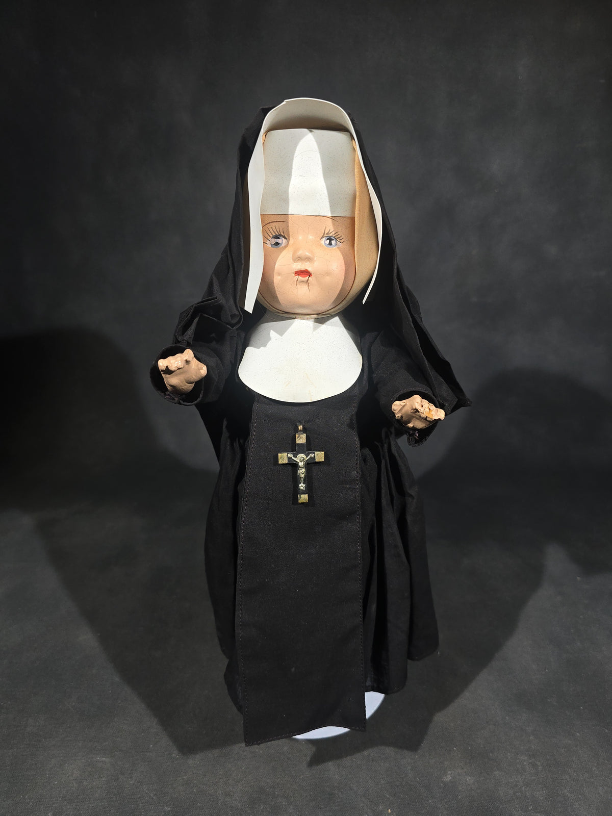 Vintage Composition Nun Doll in Black Habit with Crucifix and Metal Display Stand