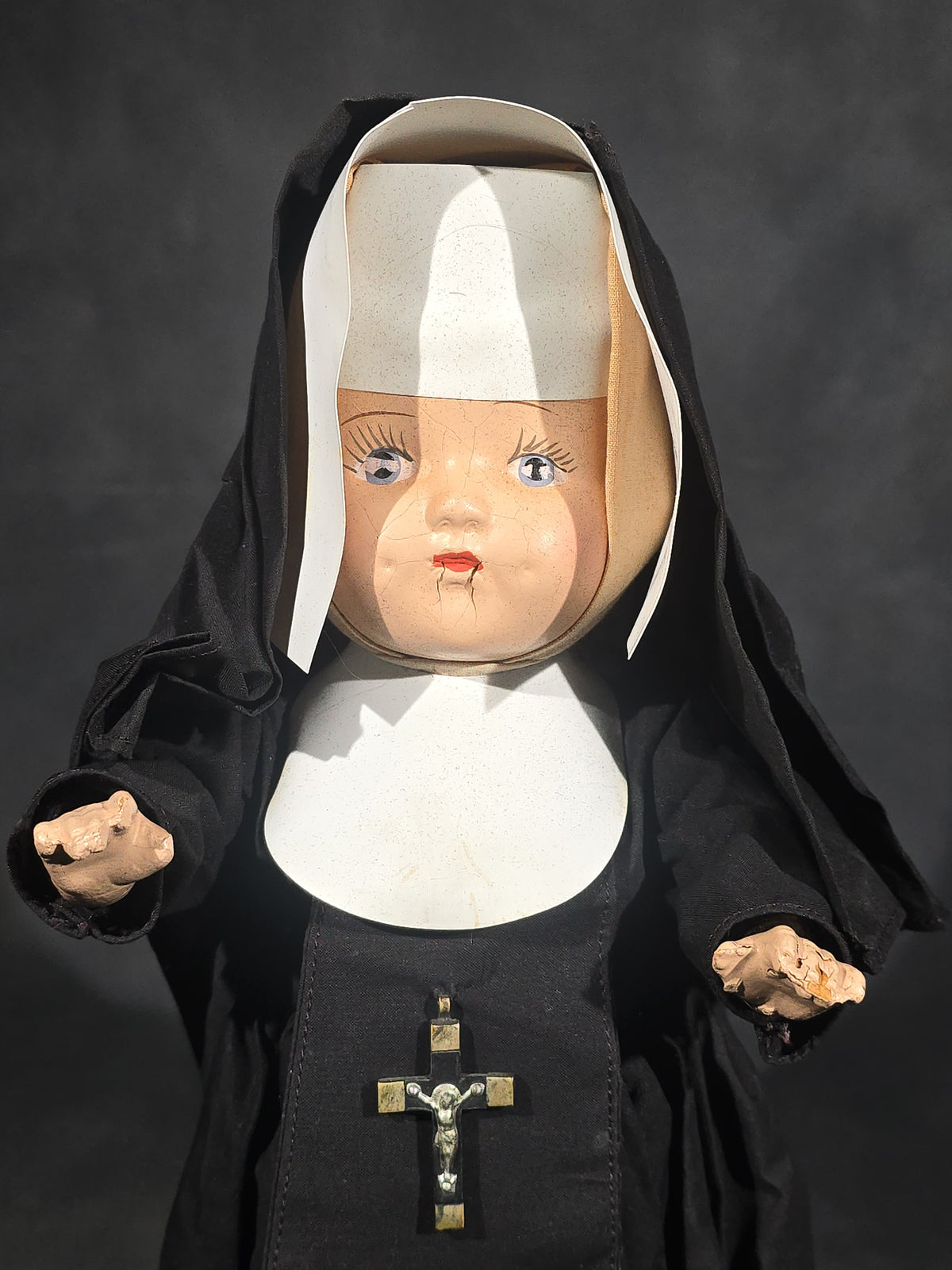 Vintage Composition Nun Doll in Black Habit with Crucifix and Metal Display Stand