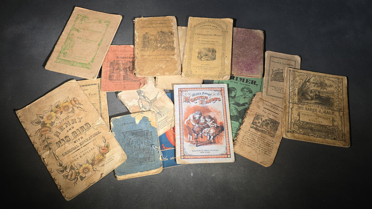 Grouping of Antique Chapbooks, Primers, and Children's Books including "Nursery Rhymes and Tales" 1826, "The Children in the Wood" 1830, "Courtship and Marriage" 1824, and "Watts Songs Against Faults" by McLoughlin Bros.