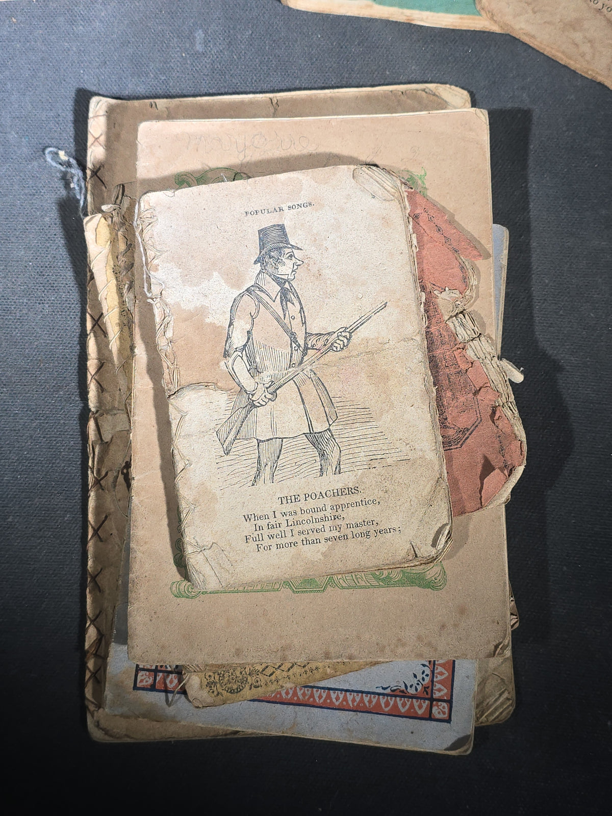 Grouping of Antique Chapbooks, Primers, and Children's Books including "Nursery Rhymes and Tales" 1826, "The Children in the Wood" 1830, "Courtship and Marriage" 1824, and "Watts Songs Against Faults" by McLoughlin Bros.