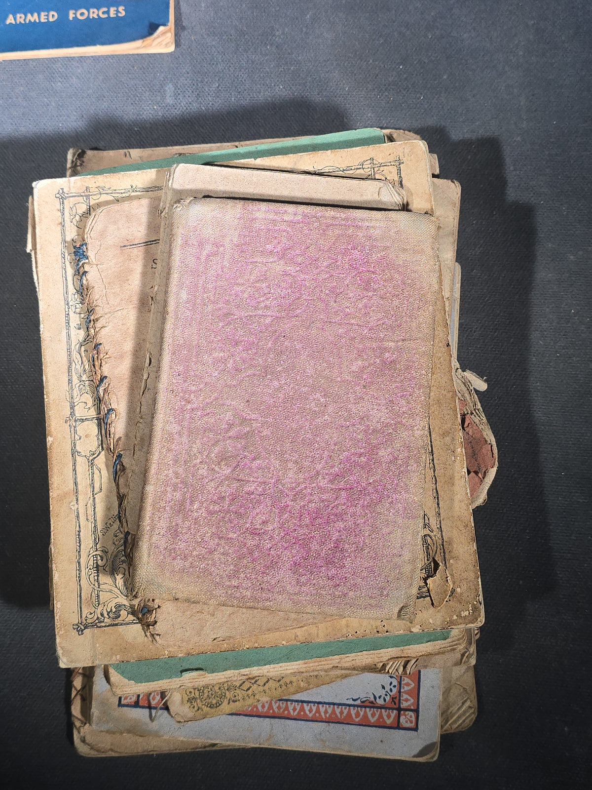 Grouping of Antique Chapbooks, Primers, and Children's Books including "Nursery Rhymes and Tales" 1826, "The Children in the Wood" 1830, "Courtship and Marriage" 1824, and "Watts Songs Against Faults" by McLoughlin Bros.