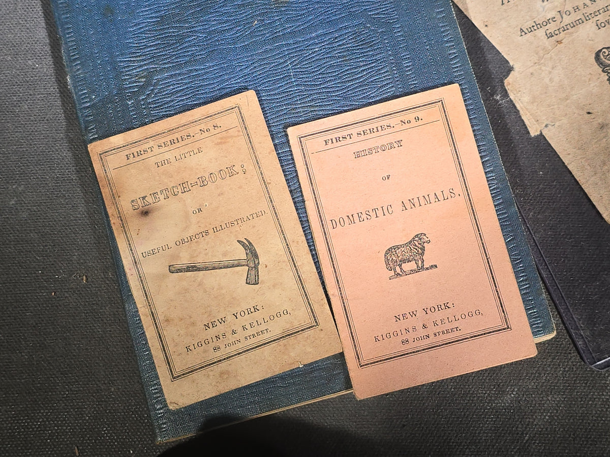 Grouping of Antique and Vintage Ephemera including "Extracts from Manual for Army Cooks" 1917, Burlington Sentinel Newspapers, Handwritten Theological Lecture Notebooks, Kiggins & Kellogg Miniature Books, and Latin Commentarius