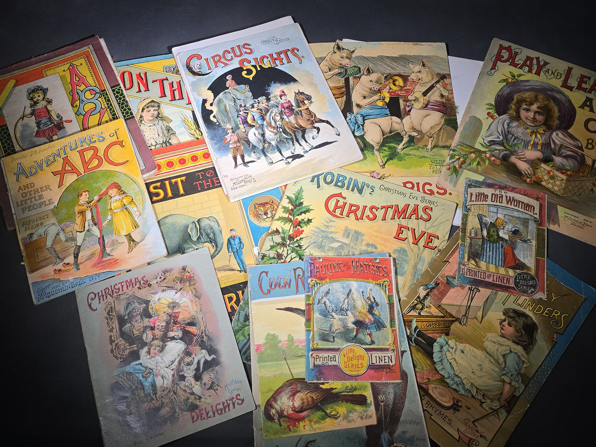 Grouping of 14 Antique Chromolithograph Children's Books Including "Circus Sights," "Visit to the Menagerie," "Adventures of ABC," "Christmas Delights," "Cock Robin," And "The Little Old Woman," Published by Mcloughlin Bros., New York