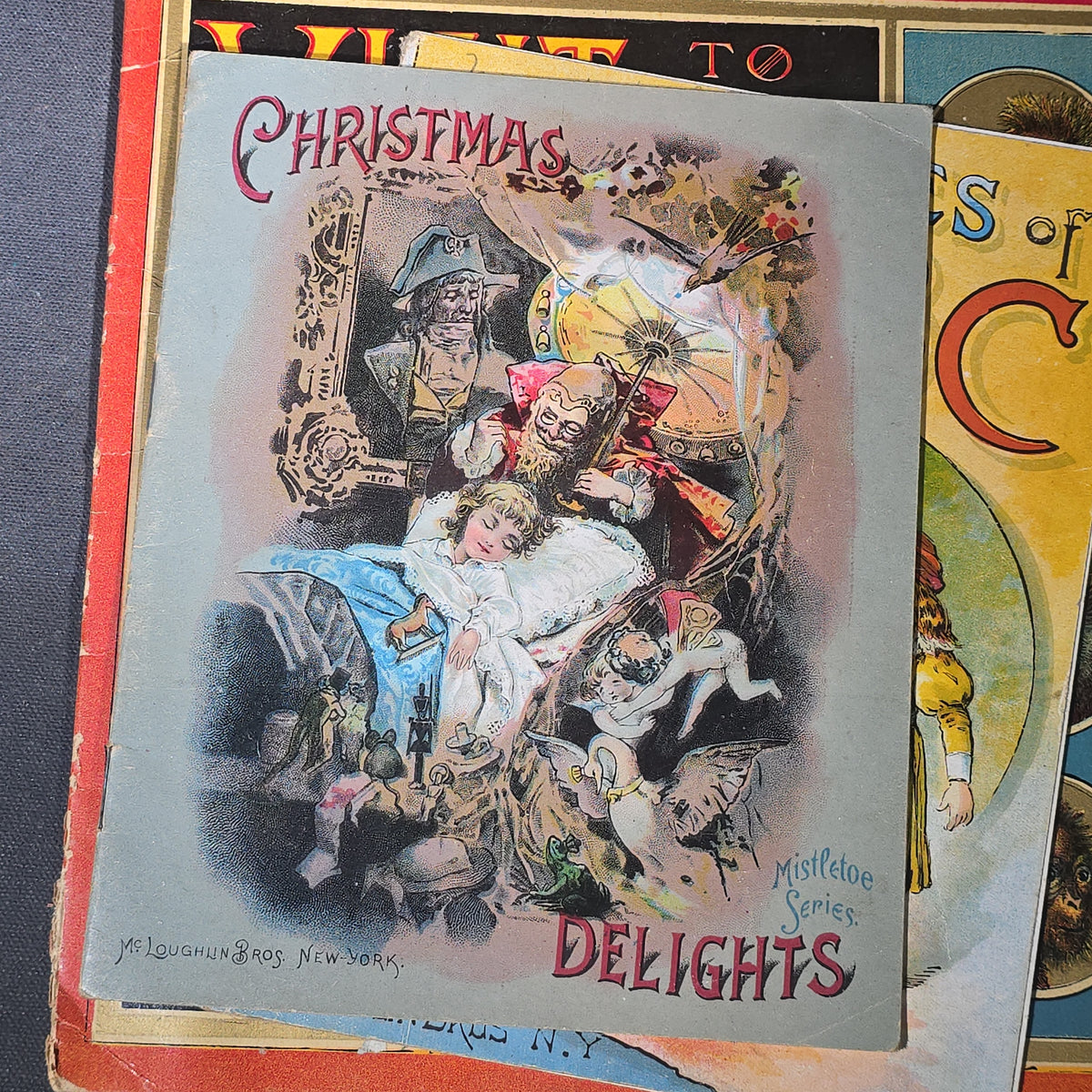 Grouping of 14 Antique Chromolithograph Children's Books Including "Circus Sights," "Visit to the Menagerie," "Adventures of ABC," "Christmas Delights," "Cock Robin," And "The Little Old Woman," Published by Mcloughlin Bros., New York