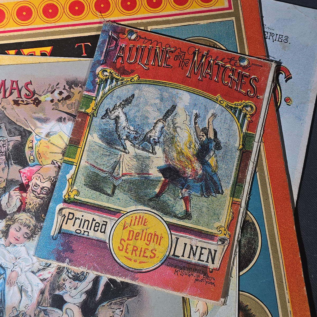 Grouping of 14 Antique Chromolithograph Children's Books Including "Circus Sights," "Visit to the Menagerie," "Adventures of ABC," "Christmas Delights," "Cock Robin," And "The Little Old Woman," Published by Mcloughlin Bros., New York