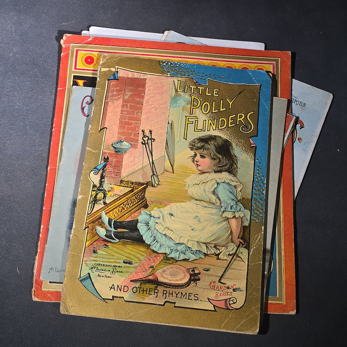 Grouping of 14 Antique Chromolithograph Children's Books Including "Circus Sights," "Visit to the Menagerie," "Adventures of ABC," "Christmas Delights," "Cock Robin," And "The Little Old Woman," Published by Mcloughlin Bros., New York