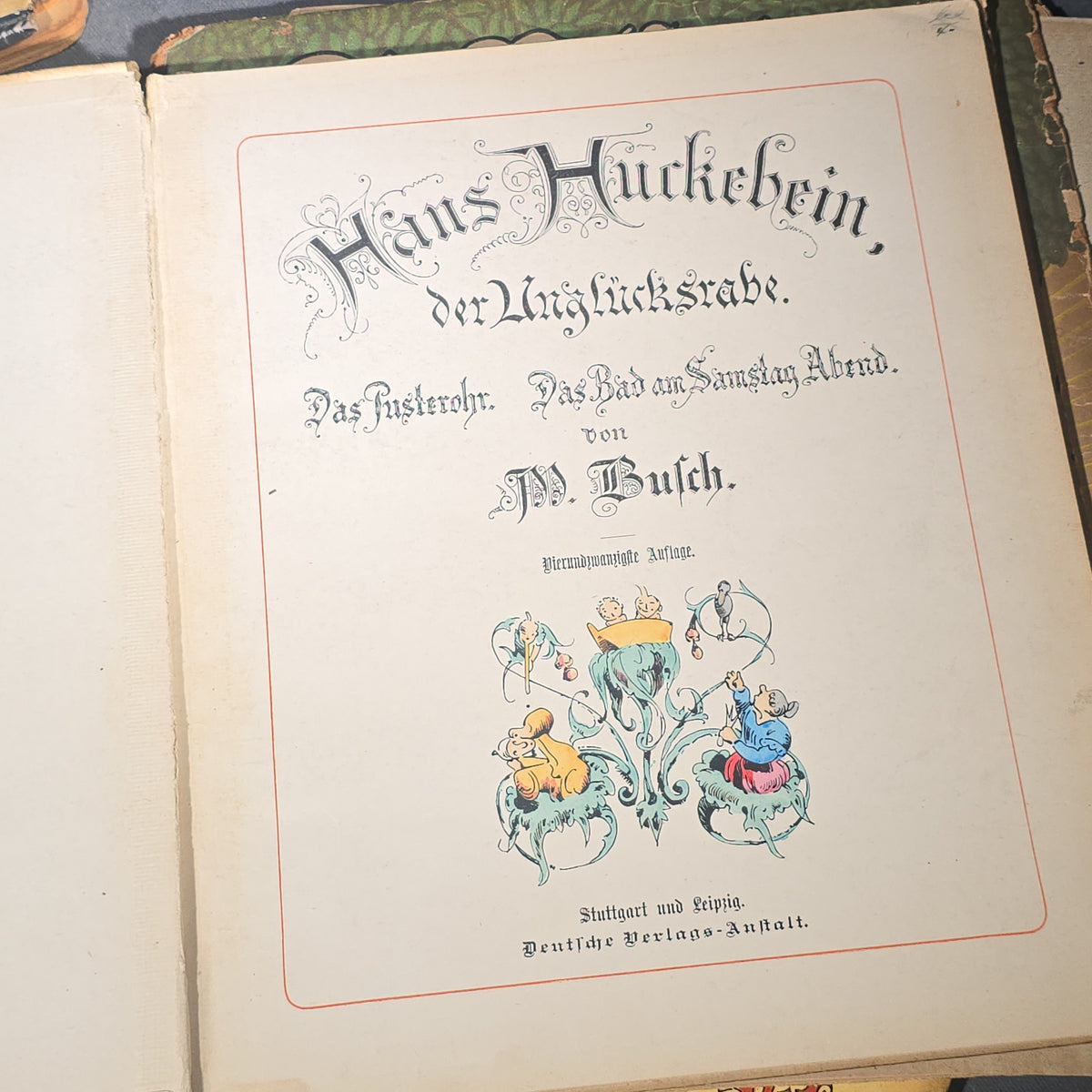 Grouping of Six Antique and Vintage German Illustrated Children's Books including "Firlefanz" ("Tomfoolery") by Hans Watzlik and Ernst Kutzer 1922, "Hans Huckebein, der Ungluecksrabe" by W. Busch, and "Die Reise in's Schlaraffenland"